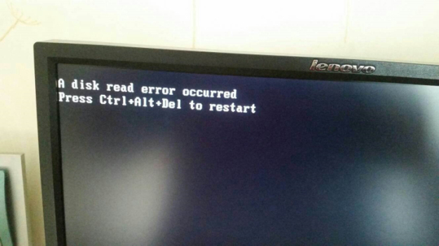 重装系统后开机出现“a disk read error occurred”的解决办法